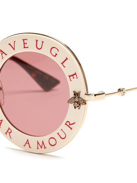 gucci pink glasses l'aveugle par amour elton john|love is blind Gucci motto.